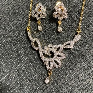 Women’s set earring and necklace